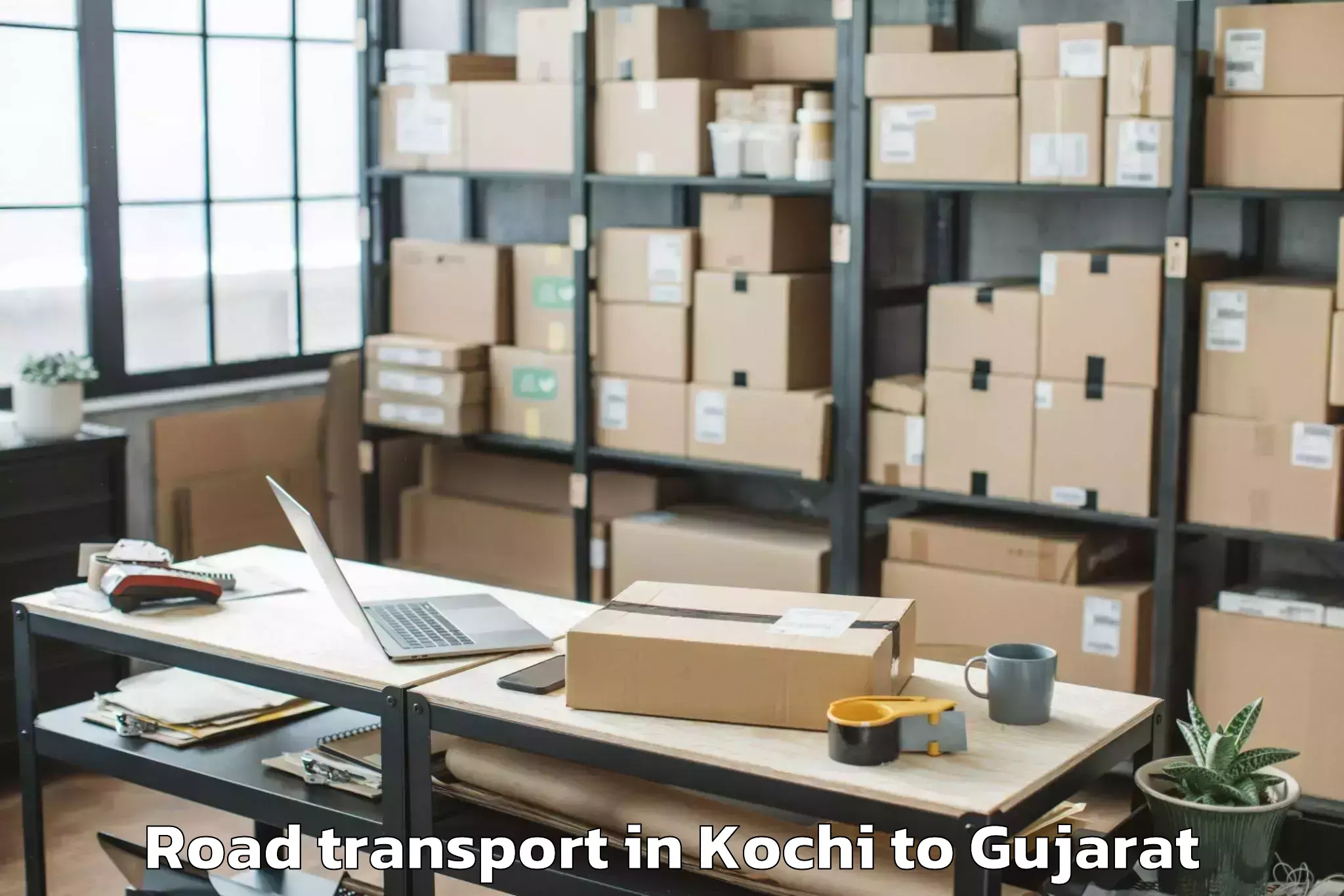 Top Kochi to Dhuwaran Road Transport Available